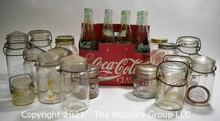 Group of Vintage Glassware Including Canning Jars and Coca-Cola Coke Bottles in Cardboard Carrier. 