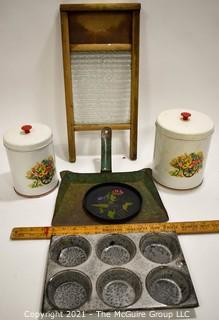 Group of Vintage Primitive Cookware.  Includes Metal Painted Canisters, Glass Washboard & Metal Enamel Graniteware Muffin Tin.