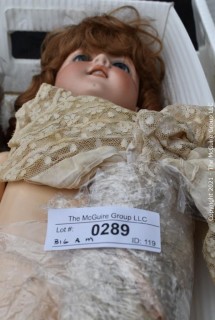 Antique: Doll:  marked "Armand Marselle" German bisque head doll w/ jointed composition body in lace outfit