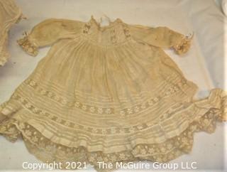 Antique: Doll:  marked "Armand Marselle" German bisque head doll w/ jointed composition body in lace outfit