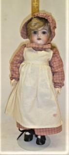 Doll:  composition body w? German bisque head by Handwerk 109-6  circa 1911 in red gingham dress and bonnet