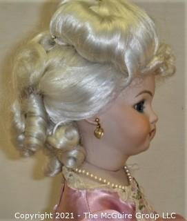 Doll: Bisque and cloth soft body w/ Simon & Halbig German bisque head and socketed shoulders circa 1912 in pink dress