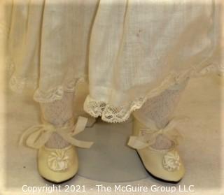 Doll: Bisque and cloth soft body w/ Simon & Halbig German bisque head and socketed shoulders circa 1912 in pink dress