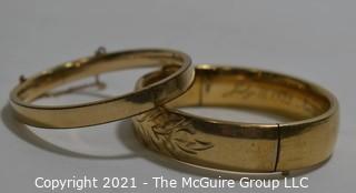 Two (2) 12 kt Gold Filled Hinged Bangle Bracelets Engraved. One made by Craftmere.   