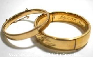 Two (2) 12 kt Gold Filled Hinged Bangle Bracelets Engraved. One made by Craftmere.   