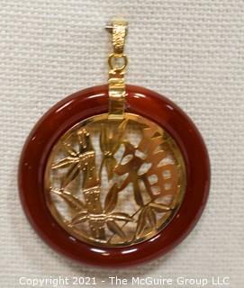 Gold Filled Asian Pendant with Carnelian Stone Surround.  1 1/2" long including bail.