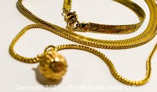 Group of Gold Filled Jewelry.  Includes Flat Herringbone Chain Necklace, Long Chain with Basket Pendant and Matching Pierced Earrings.