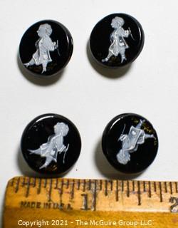 Four (4) Antique Hand Blown Lampwork Glass Buttons with Man walking.  