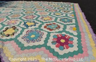 Vintage Hand Made Quilt in the Grandmother's Flower Garden Pattern Made by Elizabeth Rockwell circa 1930's.  Documented and listed in the West Virginia Heritage Quilt Search.  Some Wear due to age.