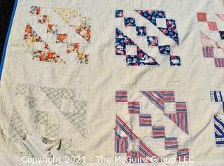 Vintage Hand Made Quilt in the Railroad Block Pattern.  Measures 70" x 80" 