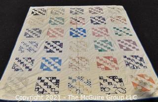 Vintage Hand Made Quilt in the Railroad Block Pattern.  Measures 70" x 80" 