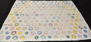 Antique Grandmother’s Flower Garden Quilt.  Measures 69" x 86" Some wear due to age.