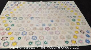 Antique Grandmother’s Flower Garden Quilt.  Measures 69" x 86" Some wear due to age.