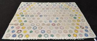 Antique Grandmother’s Flower Garden Quilt.  Measures 69" x 86" Some wear due to age.