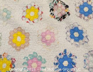 Antique Grandmother’s Flower Garden Quilt.  Measures 69" x 86" Some wear due to age.