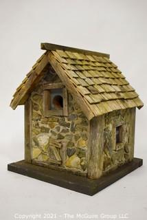 Primitive Hand Crafted Stone and Wood Bird House.   Measures 13" x 12" x 12". 