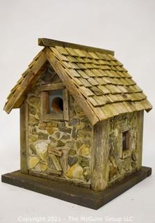 Primitive Hand Crafted Stone and Wood Bird House.   Measures 13" x 12" x 12". 