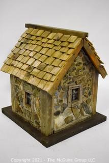 Primitive Hand Crafted Stone and Wood Bird House.   Measures 13" x 12" x 12". 