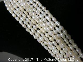 Multi-strand seed pearl necklace 