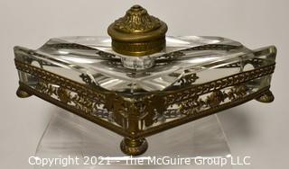 French Revival Crystal Inkwell in Brass Stand with Cherubs. Measures 9" Long.