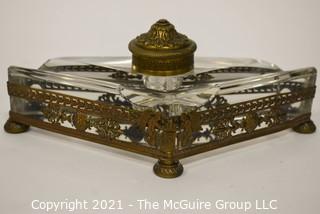 French Revival Crystal Inkwell in Brass Stand with Cherubs. Measures 9" Long.