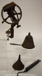 Group of Cast Iron Primitives Including Hand Crank Apple Peeler,Funnels and Spring Scale