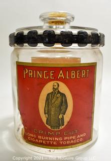 Antique Glass Prince Albert Tobacco Jar or Humidor with Back Label and Metal Locking Strap Around The Lid. Measure 7" T