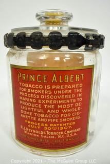 Antique Glass Prince Albert Tobacco Jar or Humidor with Back Label and Metal Locking Strap Around The Lid. Measure 7" T