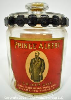 Antique Glass Prince Albert Tobacco Jar or Humidor with Back Label and Metal Locking Strap Around The Lid. Measure 7" T