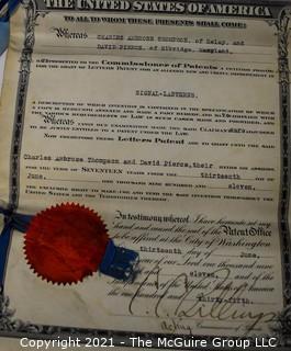 Collection of paperwork relating to the granting of a patent in 1912 for railroad signal-lanterns 