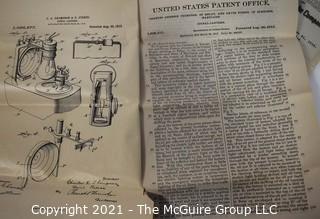 Collection of paperwork relating to the granting of a patent in 1912 for railroad signal-lanterns 