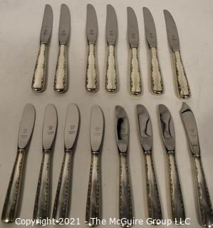 Set of Sterling Silver Flatware by Gorham in the Camilla Pattern; 1160 grams excluding dinner knives (shown separately).  