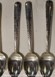 Set of Sterling Silver Flatware by Gorham in the Camilla Pattern; 1160 grams excluding dinner knives (shown separately).  