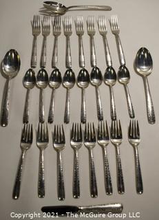 Set of Sterling Silver Flatware by Gorham in the Camilla Pattern; 1160 grams excluding dinner knives (shown separately).  