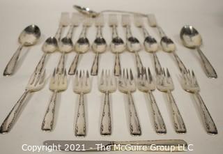 Set of Sterling Silver Flatware by Gorham in the Camilla Pattern; 1160 grams excluding dinner knives (shown separately).  