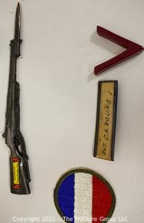 Collection of WWII Militaria Items Including Patches and Passes.