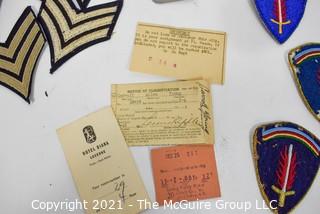 Collection of WWII Militaria Items Including Patches and Passes.