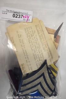 Collection of WWII Militaria Items Including Patches and Passes.