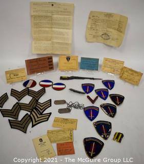 Collection of WWII Militaria Items Including Patches and Passes.