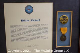 Meritorious Service Citation and Medal Presented to William Caldwell, signed by Dick Cheney, Secretary of Defense; framed under glass.  