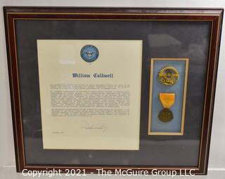 Meritorious Service Citation and Medal Presented to William Caldwell, signed by Dick Cheney, Secretary of Defense; framed under glass.  