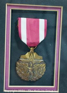 Presidential Meritorious Service Medal Presented to William Caldwell, First Lieutenant, U.S. Marine Corp; framed under glass. 