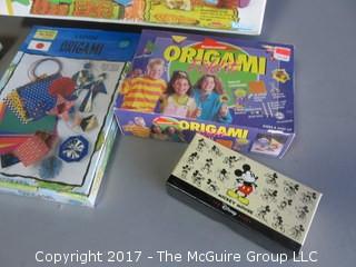 Collection including origami, puzzle and play doh