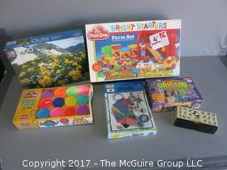 Collection including origami, puzzle and play doh