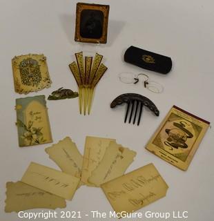 Group of Antique Victorian Vanity Drawer Items.  Includes Daguerreotype Photo of Young Boy, Calling Cards, Hair Combs, Spectacles Eye Glasses and Easter Greeting Cards. 