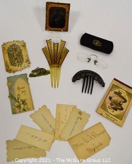 Group of Antique Victorian Vanity Drawer Items.  Includes Daguerreotype Photo of Young Boy, Calling Cards, Hair Combs, Spectacles Eye Glasses and Easter Greeting Cards. 