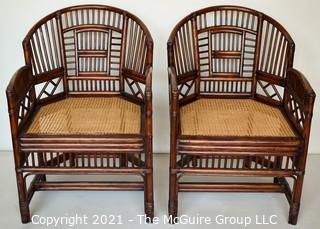 Two (2) Asian Style Rattan Arm Chairs with Cane Seats.  Measure 34" x 22" x 20".