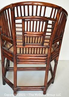 Two (2) Asian Style Rattan Arm Chairs with Cane Seats.  Measure 34" x 22" x 20".