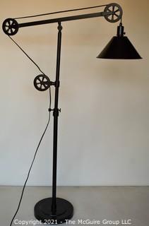 Contemporary Industrial Style Adjustable Floor Lamp with Pulleys. 