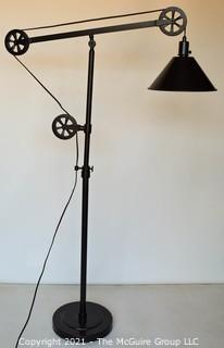 Contemporary Industrial Style Adjustable Floor Lamp with Pulleys. 